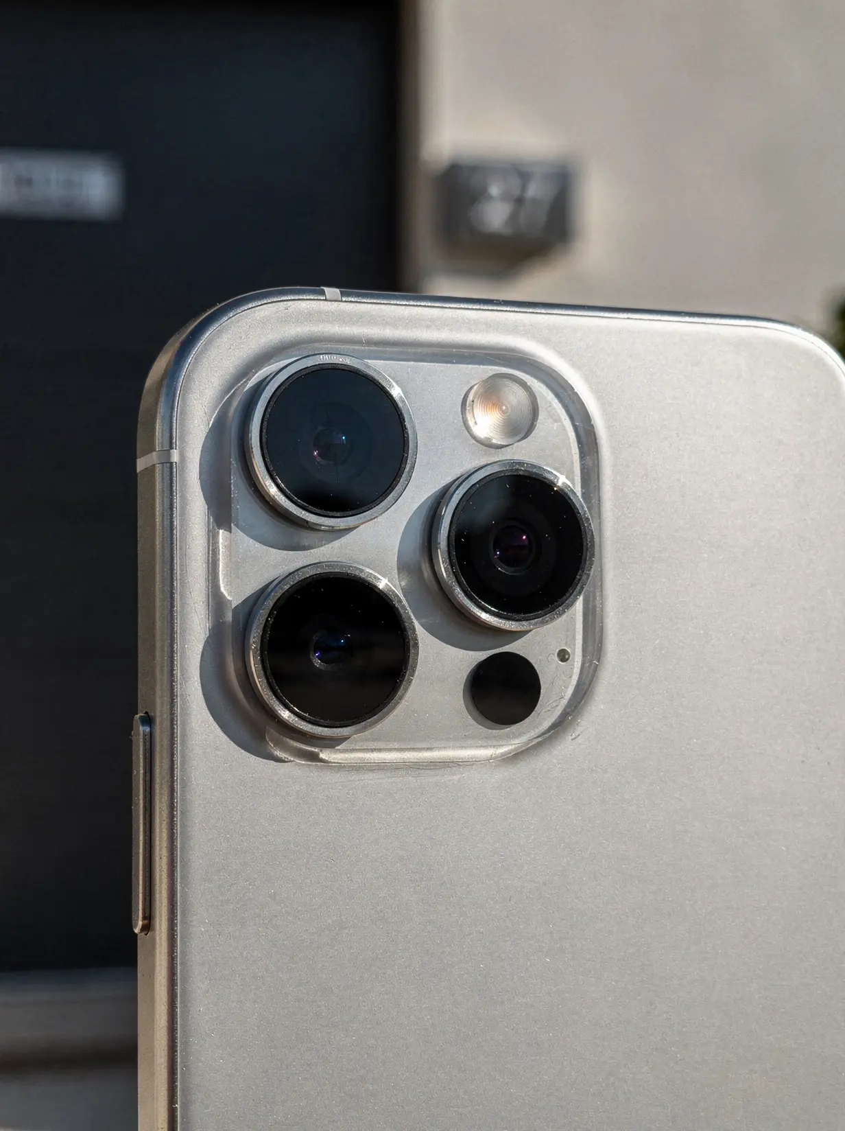 Repaired smartphone camera array with two crack-free lenses after West Perth repair.